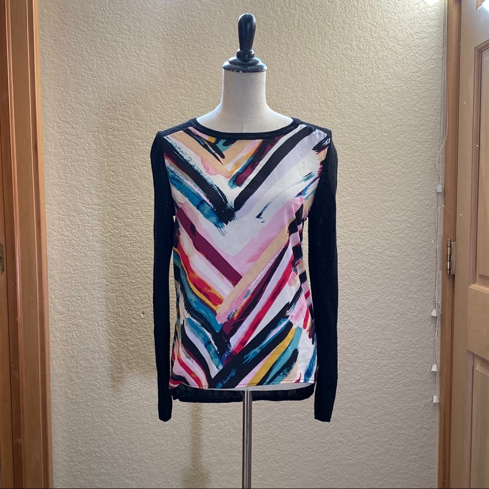 multicolor rainbow and black sweater